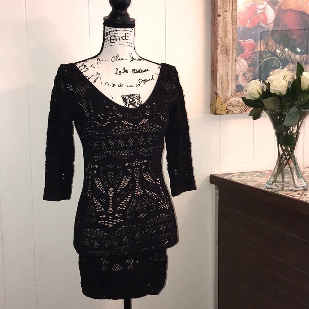 BEBE black bodycon dress Size M/L on size 2 model